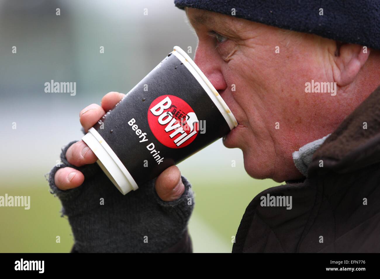 a-man-drinking-a-hot-cup-of-bovril-beef-drink-on-a-very-cold-day-picture-EFN776.jpg